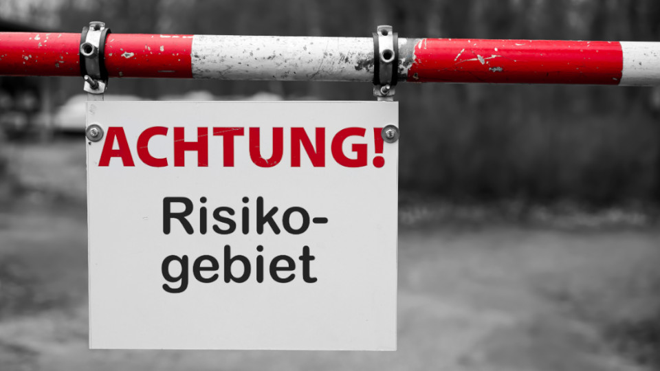 Schild mit der Aufschrift: Achtung! Risikogebiet